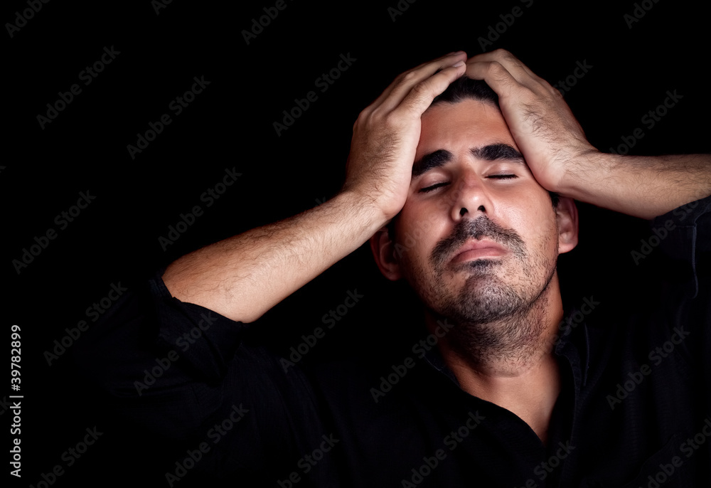 Portrait of a stressed and sad young man Portrait of a stressed and sad young man