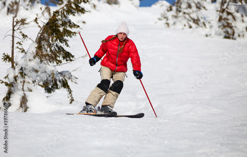 Young woman skiing in mountains