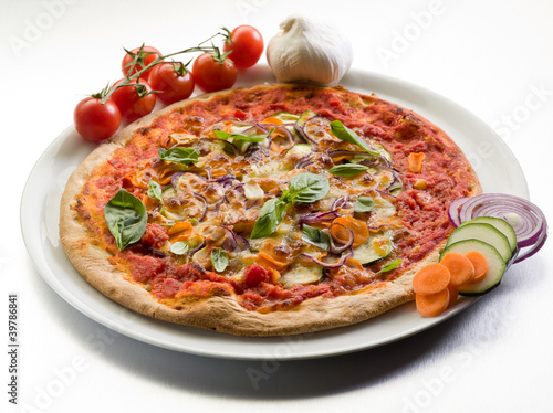 vegetarian pizza with zucchinis carrots,onions and mozzarella