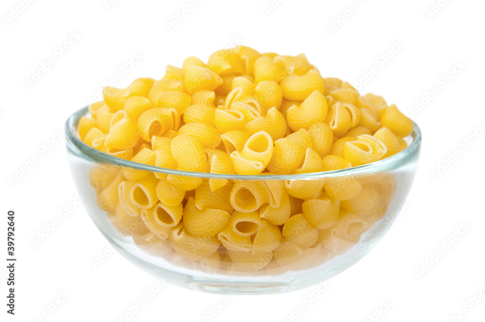 Raw macaroni in glass dish isolated on white background
