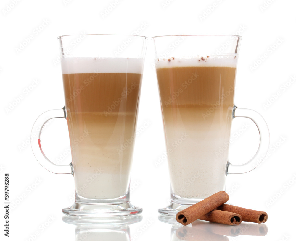 Fragrant сoffee latte in glass cups and cinnamon isolated Fragrant сoffee latte in glass cups and cinnamon isolated