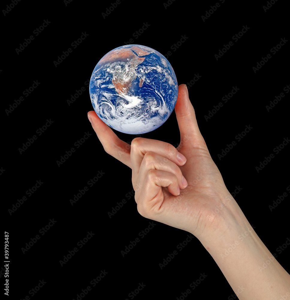Planet earth in fingers.Elements of this image furnished by NASA Planet earth in fingers.Elements of this image furnished by NASA