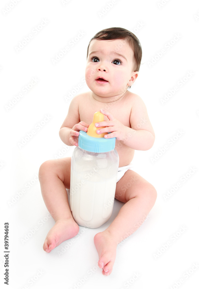 Baby holding giant bottle of milk Baby holding giant bottle of milk