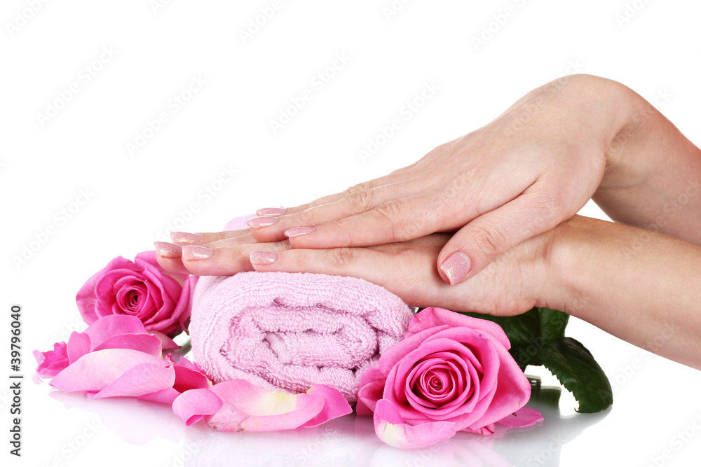 Pink towel with roses and hands on white background Pink towel with roses and hands on white background