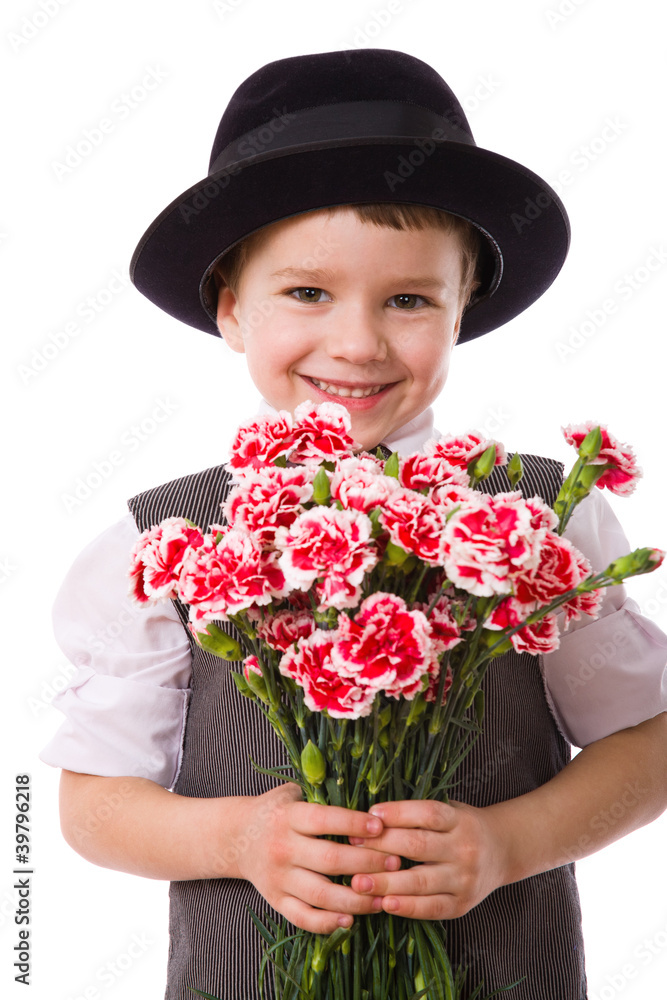 Happy boy with a bouquet of carnations Happy boy with a bouquet of carnations
