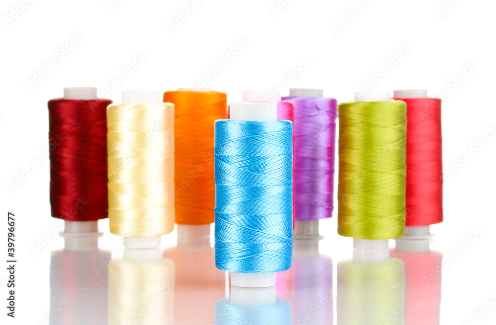 Many spools of thread isolated on white Many spools of thread isolated on white
