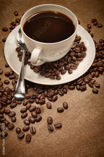 Cup of coffee on wood background