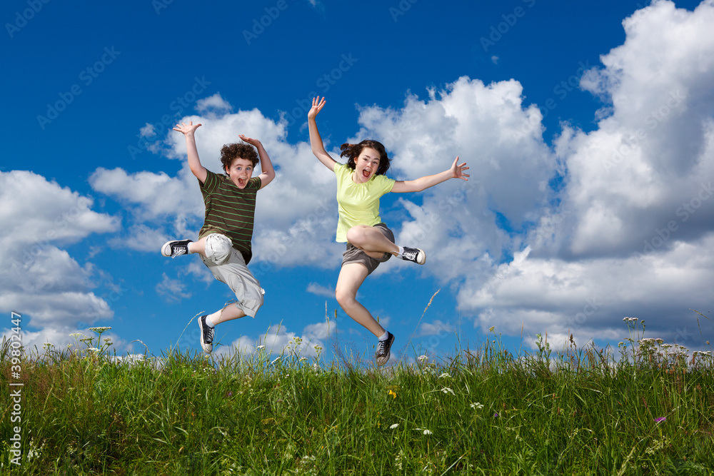 Girl and boy running, jumping outdoor Girl and boy running, jumping outdoor