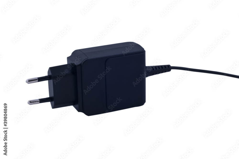 Power adapter and cord on isolated white background