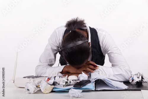 Young South African woman overwhelmed by workand stress. photo