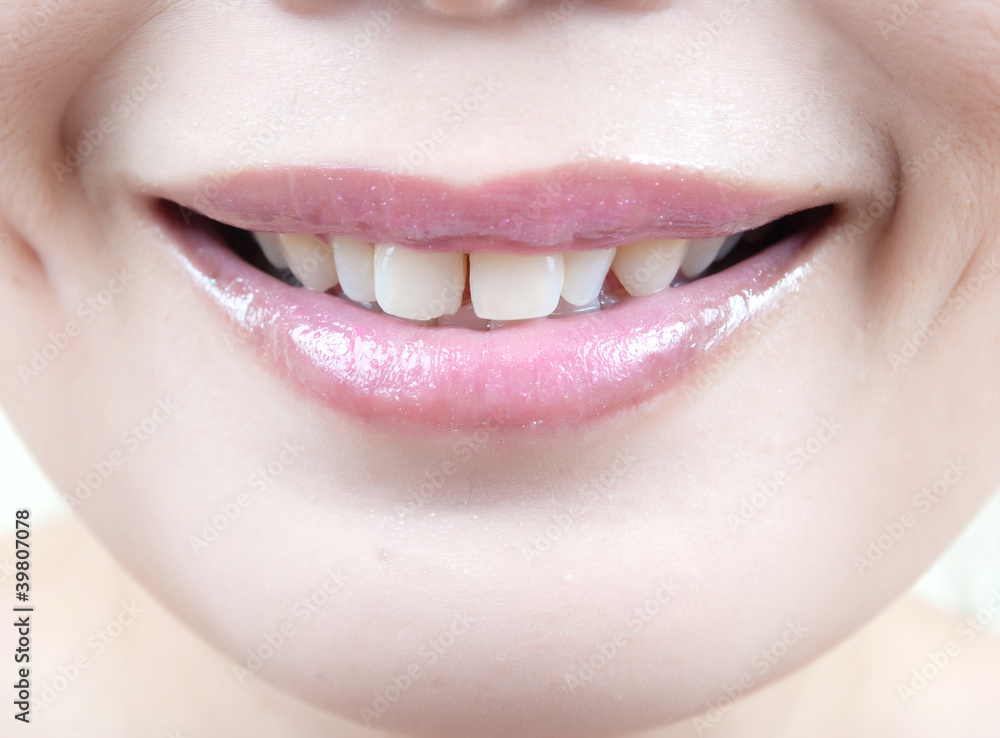 Fototapeta premium Lips of an Asian young woman.