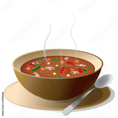 Bowl of hot vegetable soup on plate
