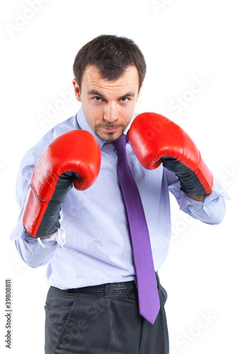 Portrait of a business man in red boxing gloves