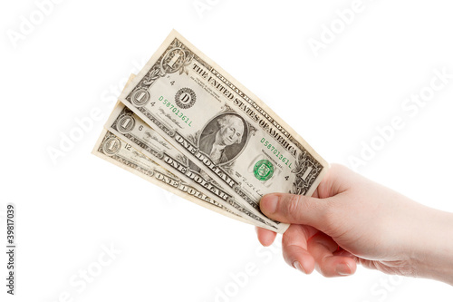 Hand holding dollars