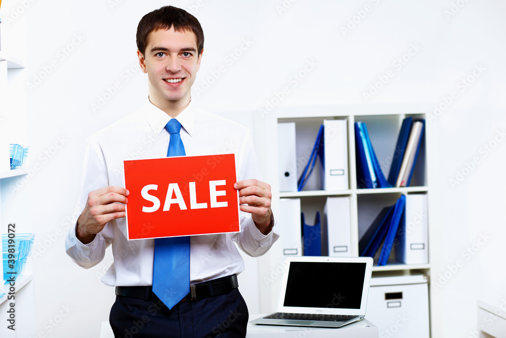 Young businessman in office Young businessman in office