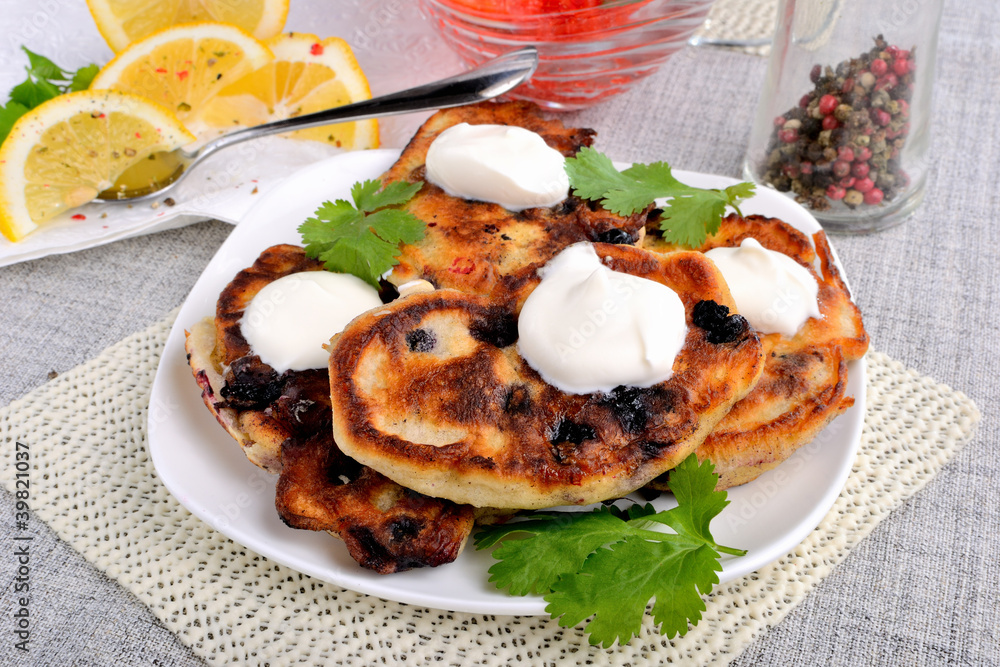 Fried pancakes with blackcurrant Fried pancakes with blackcurrant