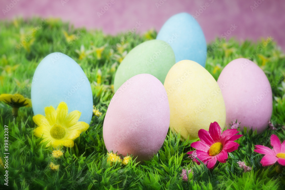 easter eggs on a flowering garden easter eggs on a flowering garden