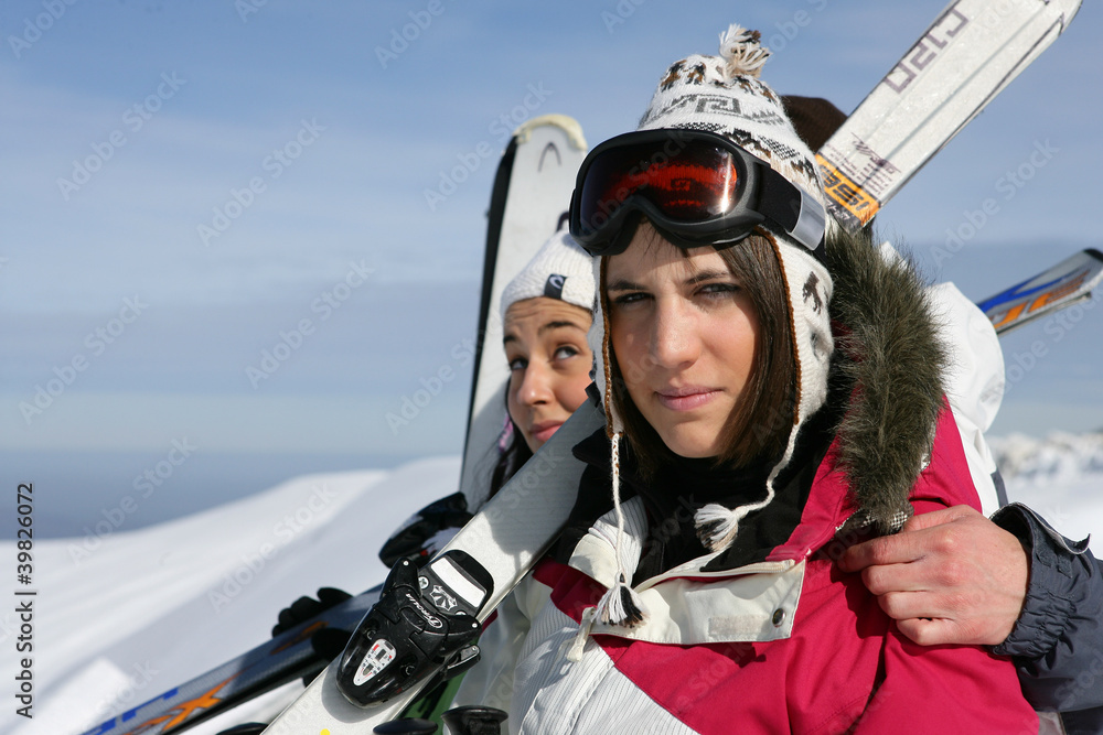 Two woman having a good time on skiing holiday Two woman having a good time on skiing holiday