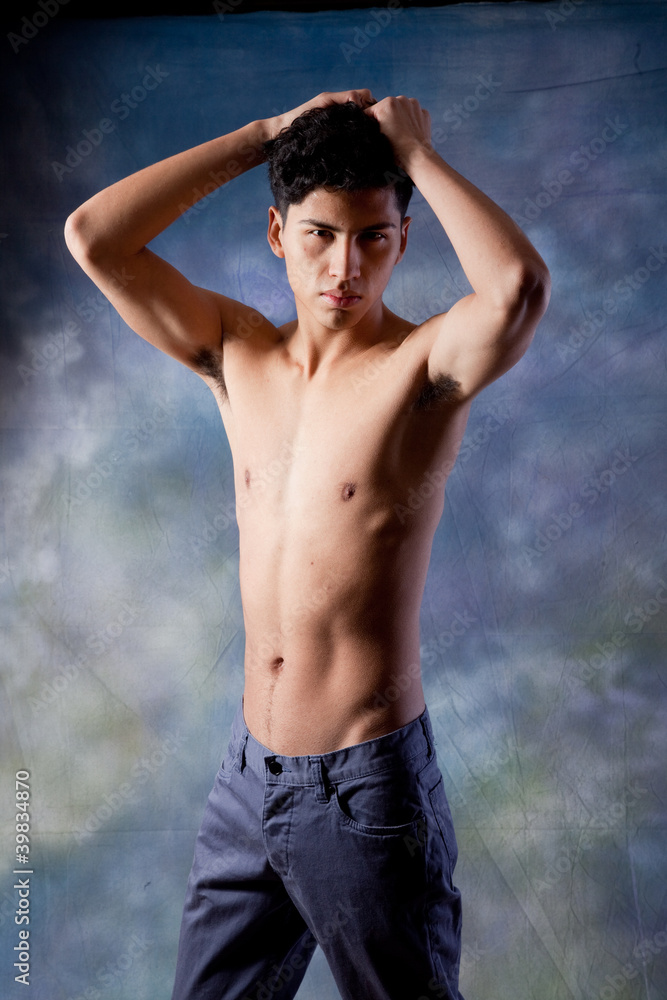Hispanic Man Shirtless And Looking At The Camera Stock Photo Adobe Stock