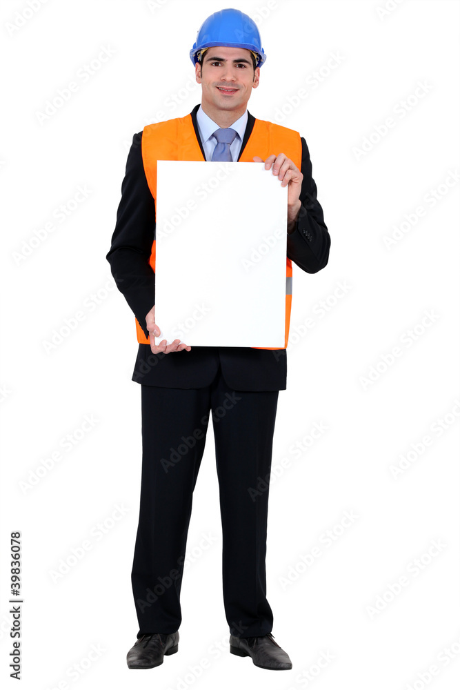 Entrepreneur showing white sign for message Entrepreneur showing white sign for message