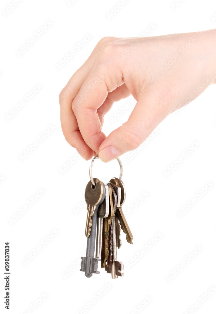Bunch of keys in hand isolated on white Bunch of keys in hand isolated on white