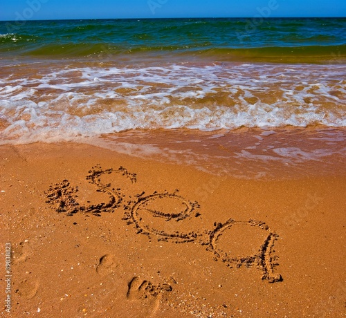 sea sign on a sand