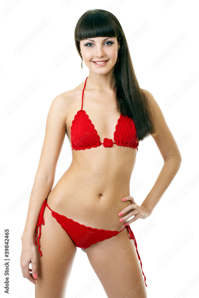 Fototapeta premium Sexy underwear model posing in a studio in a handmade swimsuit
