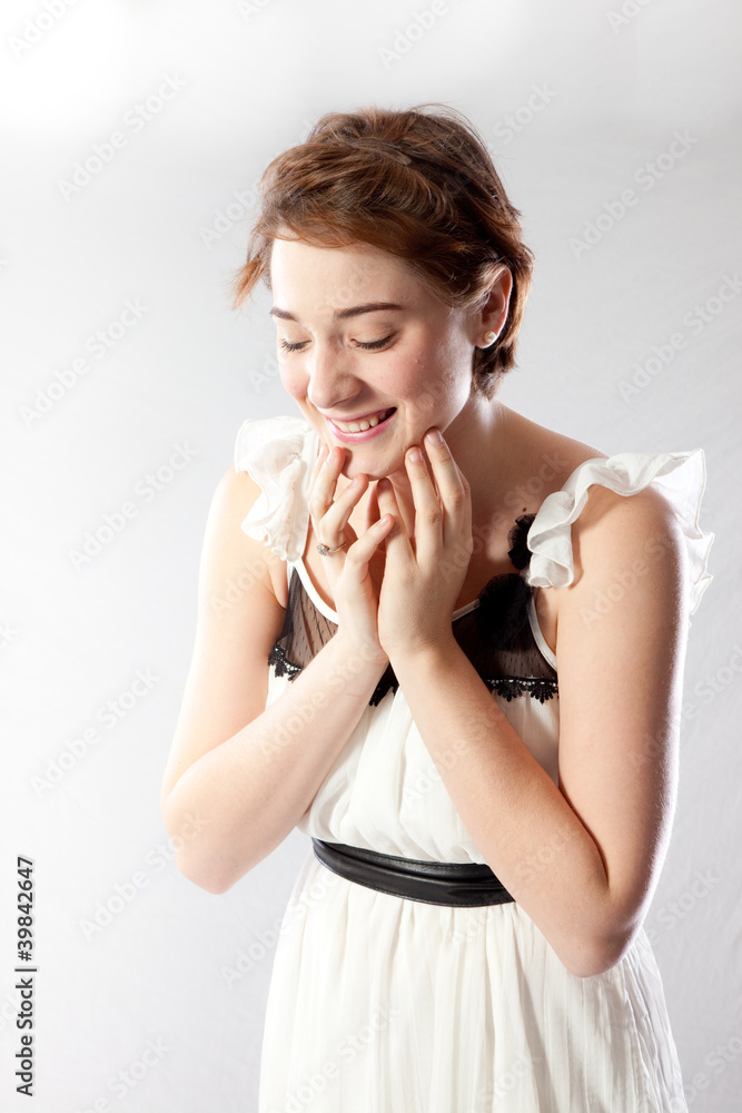 woman looking pleasingly and thoughtfully suprised woman looking pleasingly and thoughtfully suprised