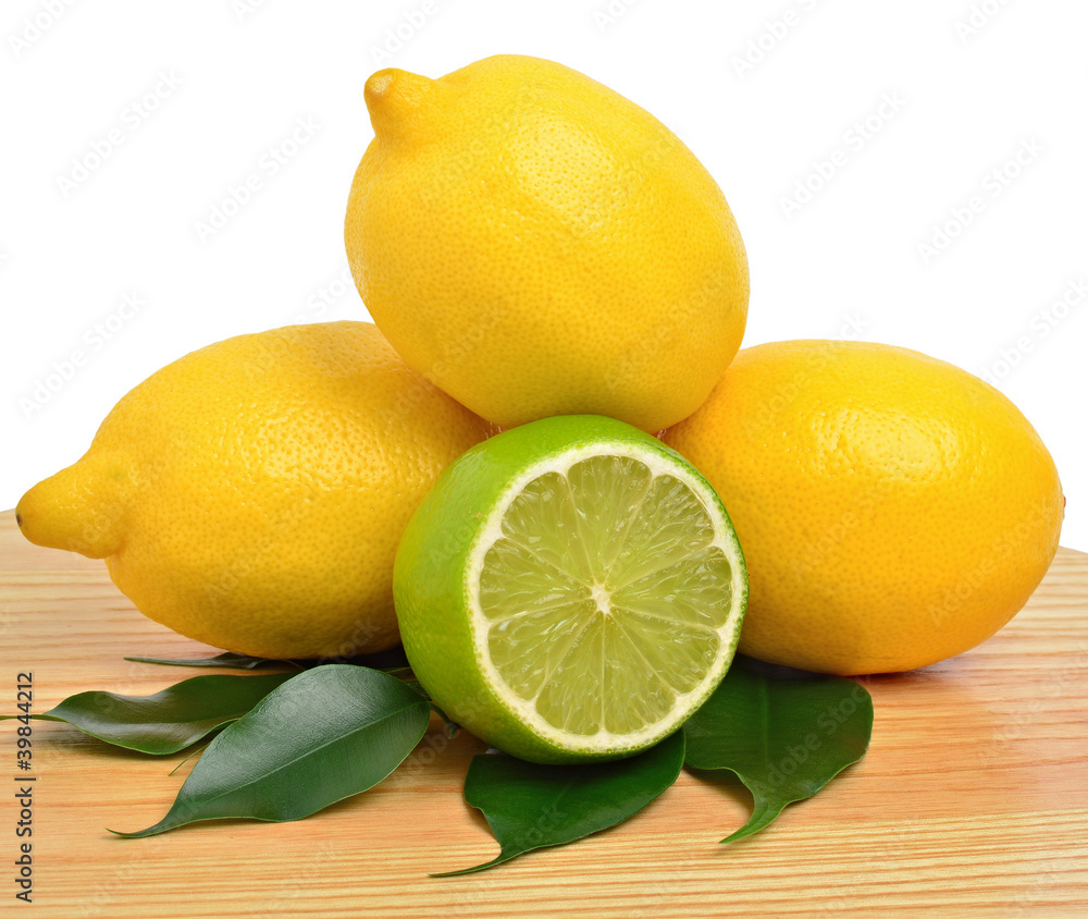 Cut lime and  lemon with a green leaves