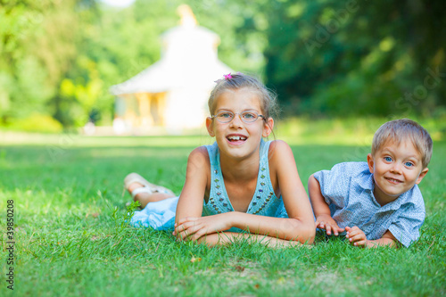Wallpaper Mural Little boy and his sister in the summer park Torontodigital.ca