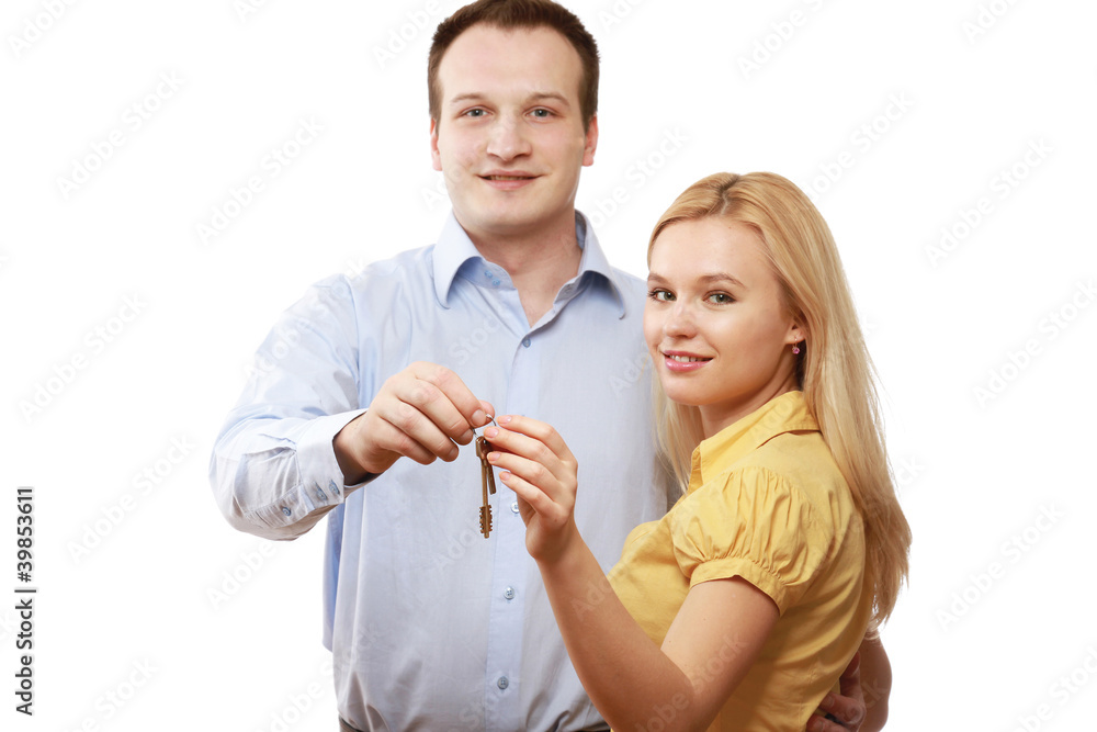 Closeup of a young couple with keys Closeup of a young couple with keys