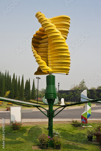 Vertical axis wind turbines in park photo