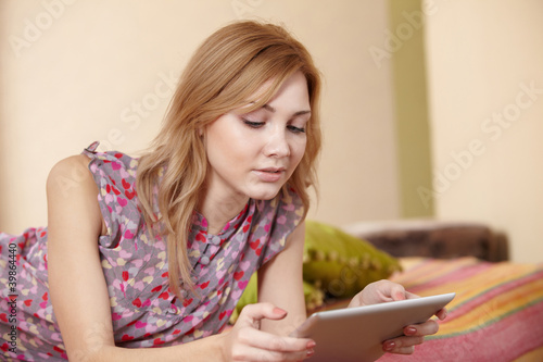 woman holding a touchpad pc