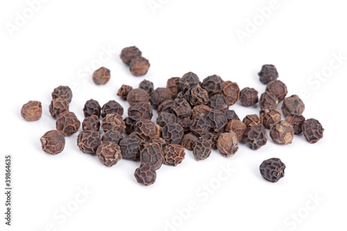 Pile Black pepper (Piper nigrum) isolated on white background.