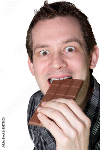 man eating chocolaet photo