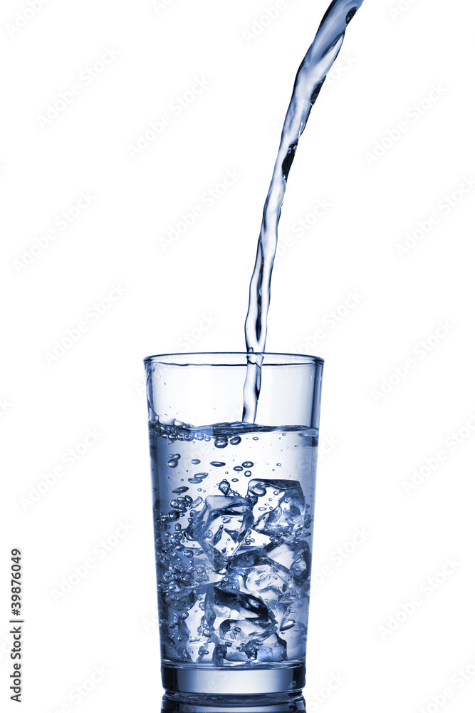 water pouring into glass isolated on white water pouring into glass isolated on white