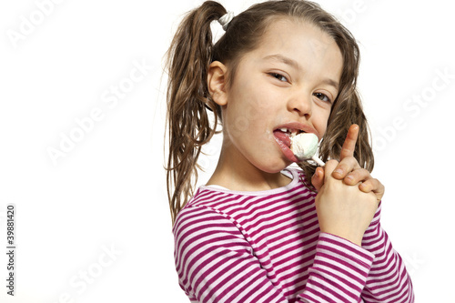 Girl with a lollipop  isolated on white background
