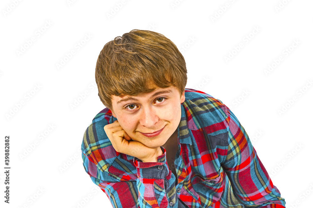 happy boy in studio looking confident and smart with head on his happy boy in studio looking confident and smart with head on his