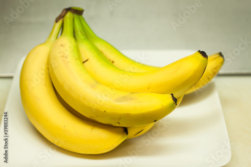 bananas on white plate