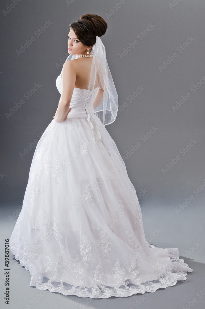 Bride in wedding dress in studio shooting
