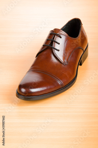 Brown shoes on wooden table © Elnur