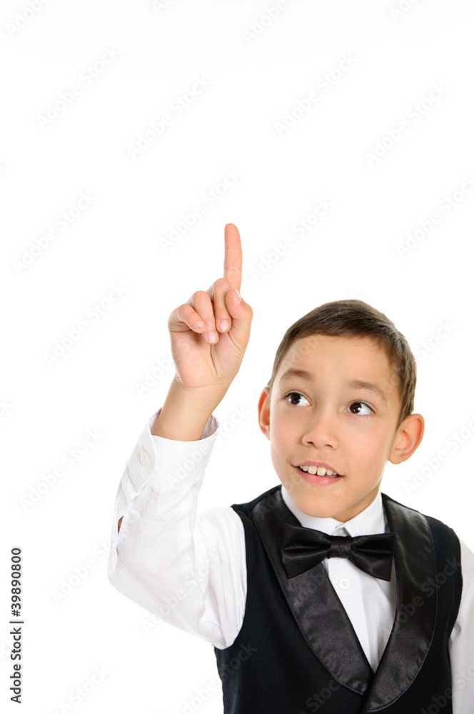 school boy in black suit touching something with his finger isol school boy in black suit touching something with his finger isol