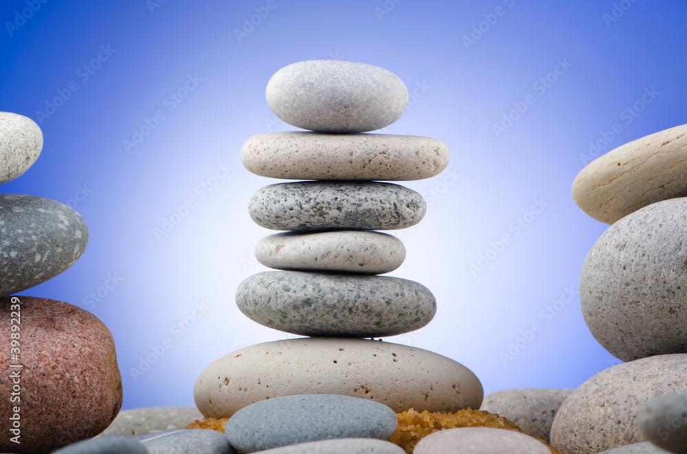 Balanced pebbles with colour background Balanced pebbles with colour background