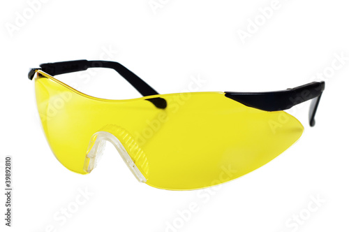 Yellow working goggles, it is isolated on white