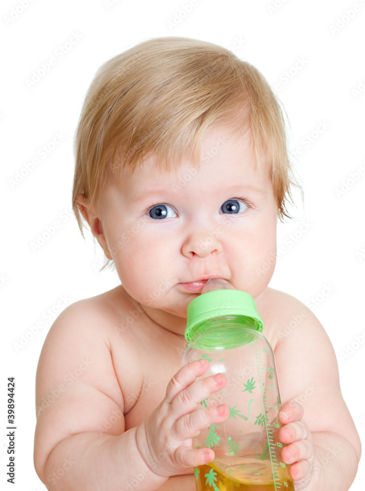 adorable child drinking from bottle. 6 months old girl. adorable child drinking from bottle. 6 months old girl.