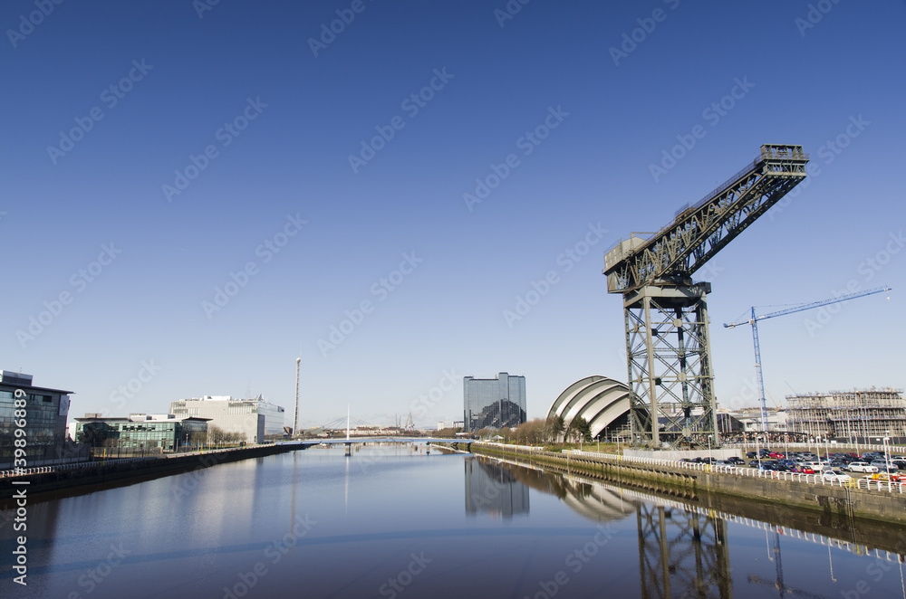 Sunny Glasgow river scene showing landmarks