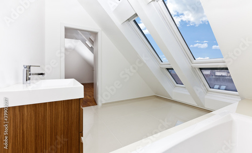 Sunlit modern bathroom of Contemporary apartment.