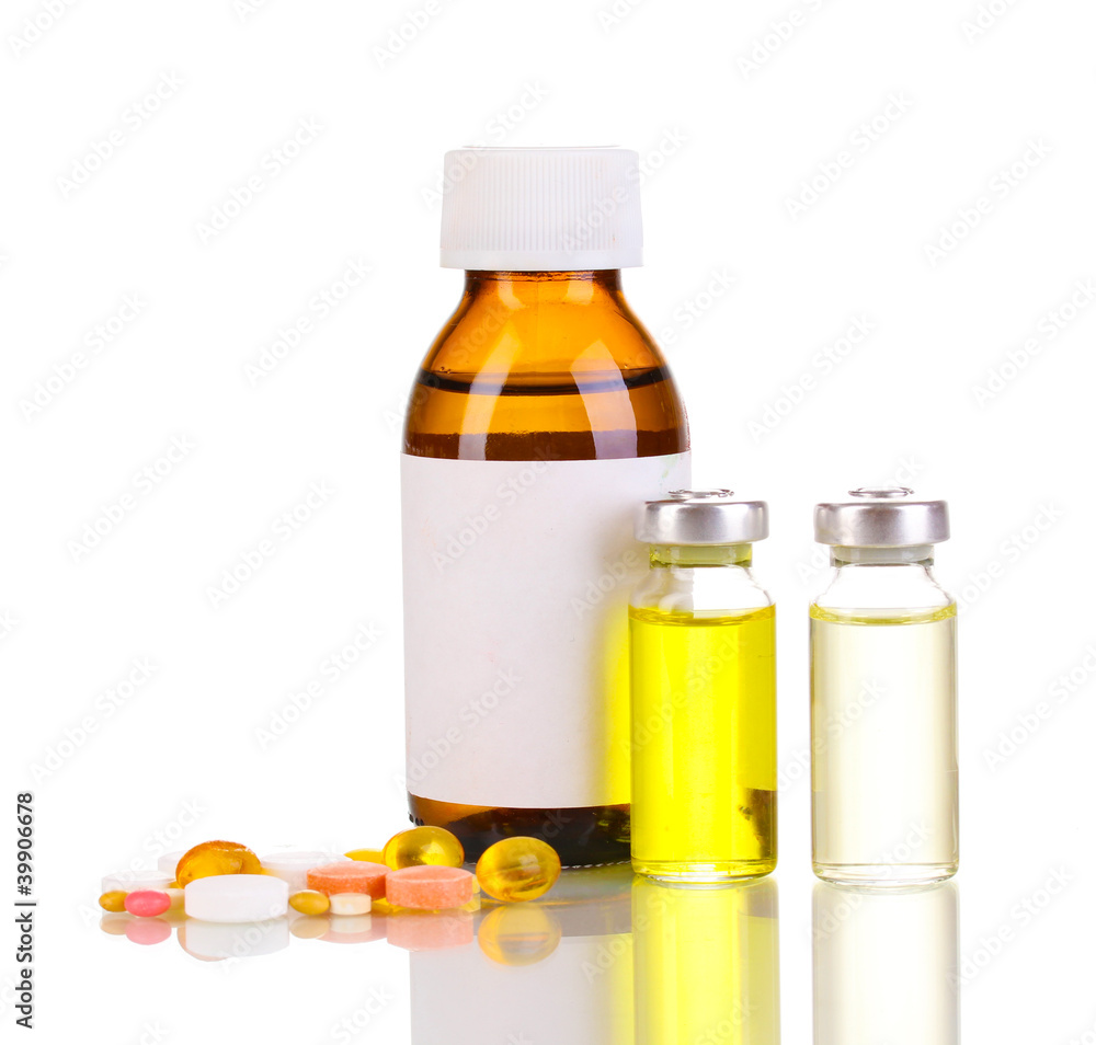 Medical bottles with tablets and ampoules isolated on white