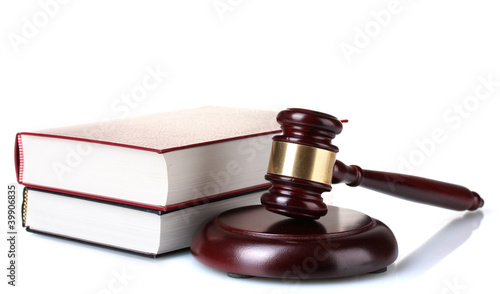 wooden gavel, glasses and books isolated on white