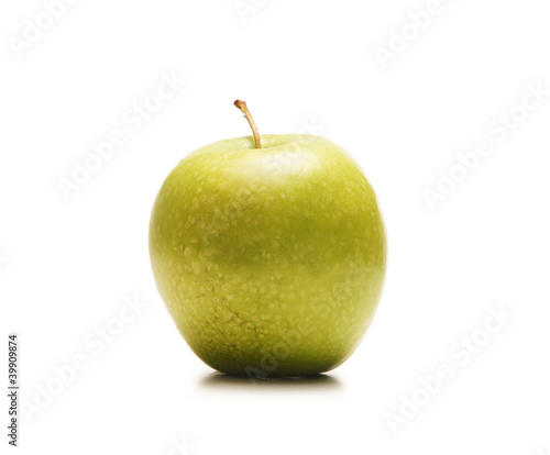 A fresh green apple isolated on a white background
